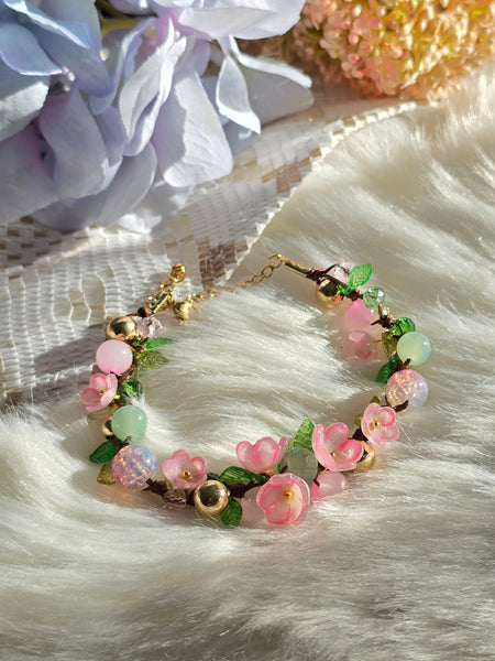 Bracelet fleurs roses